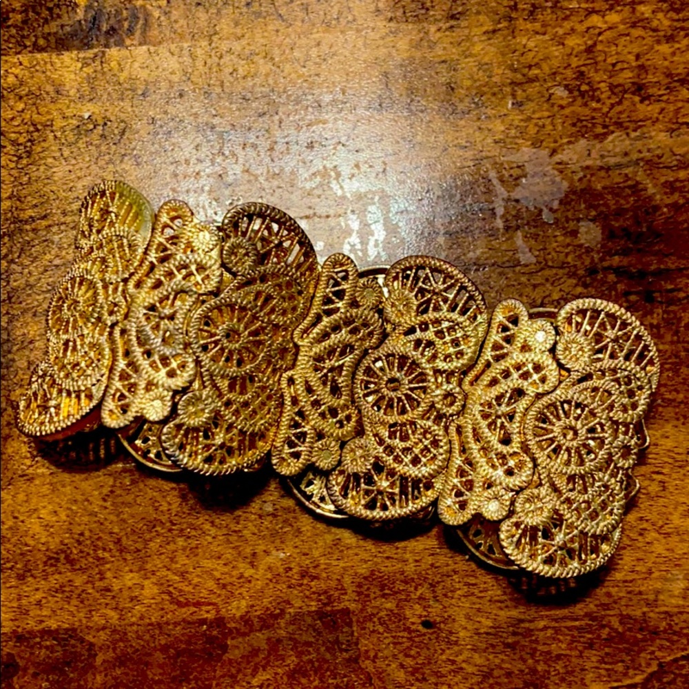 Beautiful gold tone wide stretch bracelet